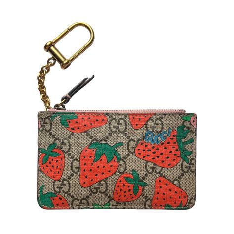 gucci pet strawberry|Gucci strawberry keychain wallet.